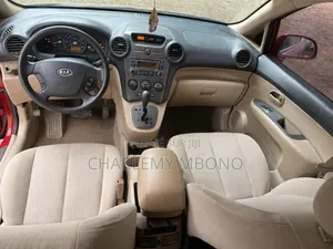 Kia Rondo 2009 Rouge
