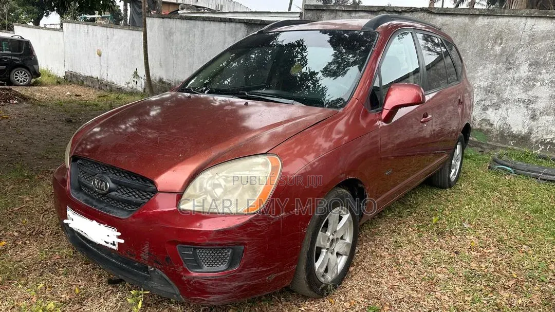 Kia Rondo 2009 Rouge
